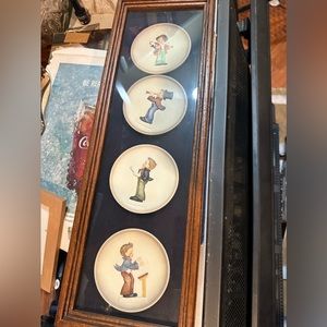 Set of 4 Hummel mini plates in wooden fram